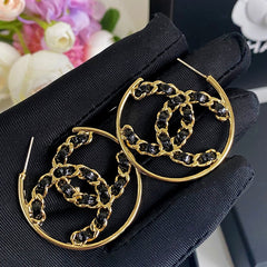 Gold Tone Black Leather Earrings