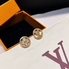 Fashionable asymmetrical diamond earrings