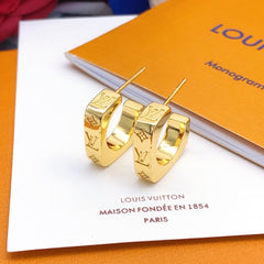 Fashionable embossed brass earrings