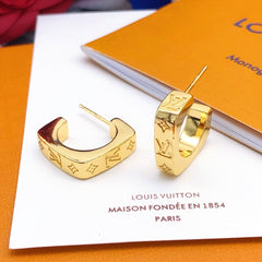 Fashionable embossed brass earrings